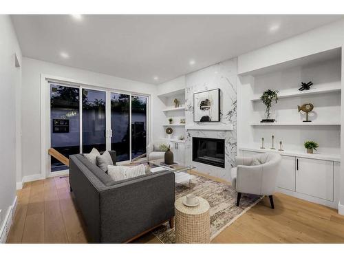 3727 Richmond Road Sw, Calgary, AB - Indoor Photo Showing Living Room With Fireplace