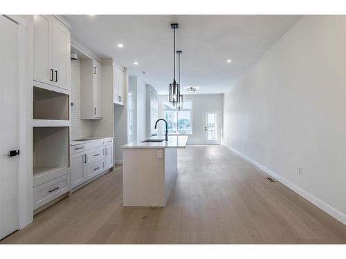 11 Wolf Crescent, Okotoks, AB - Indoor Photo Showing Kitchen With Upgraded Kitchen