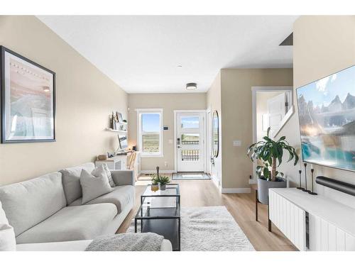 209 Livingston Common Ne, Calgary, AB - Indoor Photo Showing Living Room