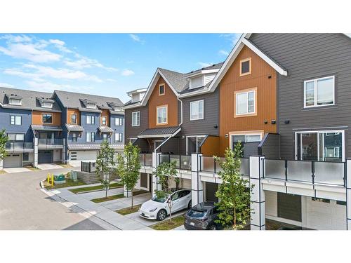 209 Livingston Common Ne, Calgary, AB - Outdoor With Balcony With Facade