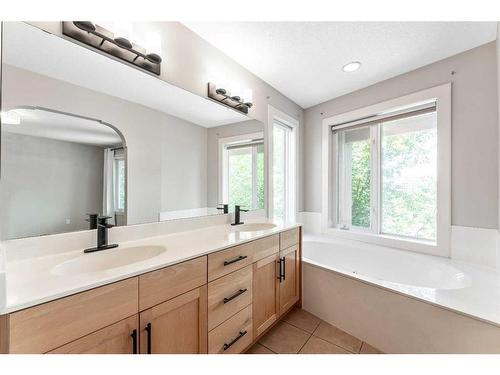 212A 12A Street Ne, Calgary, AB - Indoor Photo Showing Bathroom