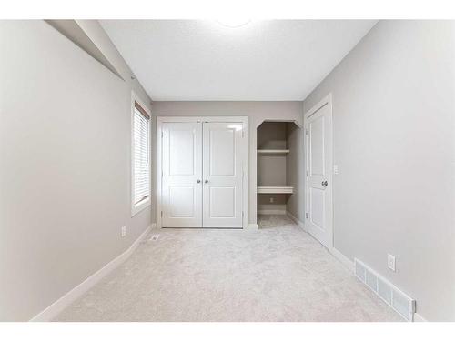 212A 12A Street Ne, Calgary, AB - Indoor Photo Showing Other Room