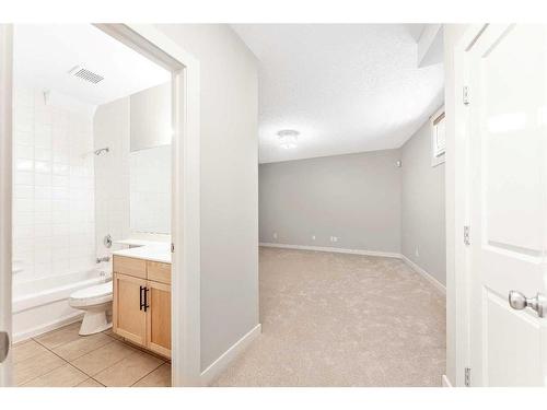 212A 12A Street Ne, Calgary, AB - Indoor Photo Showing Bathroom