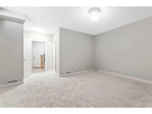 212A 12A Street Ne, Calgary, AB - Indoor Photo Showing Other Room