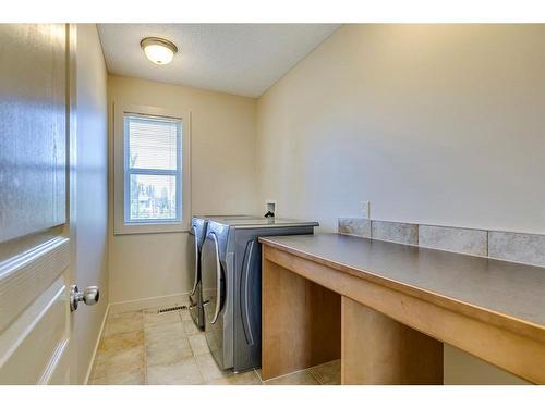 50 Elgin Park Road Se, Calgary, AB - Indoor Photo Showing Laundry Room