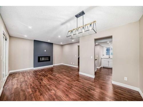 503-340 Falconridge Crescent Ne, Calgary, AB - Indoor With Fireplace