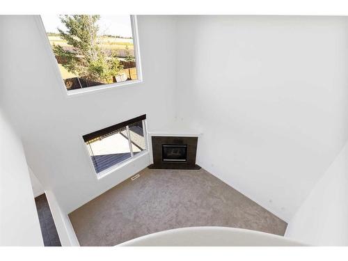 208 East Lakeview Place, Chestermere, AB - Indoor With Fireplace