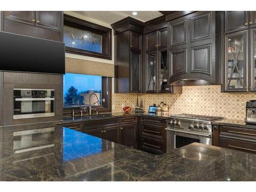 12 Westbluff Bay, Rural Rocky View County, AB - Indoor Photo Showing Kitchen With Upgraded Kitchen