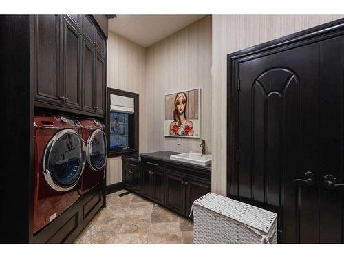 12 Westbluff Bay, Rural Rocky View County, AB - Indoor Photo Showing Laundry Room