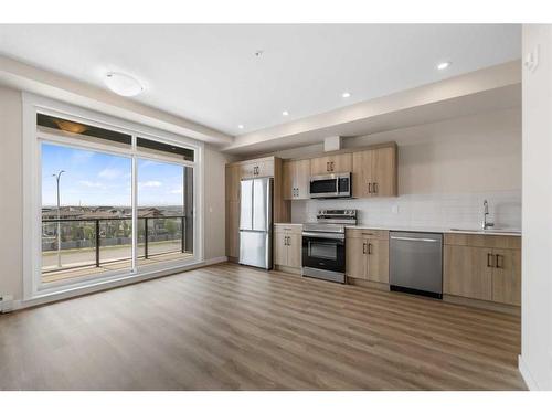 2308-55 Lucas Way Nw, Calgary, AB - Indoor Photo Showing Kitchen With Stainless Steel Kitchen