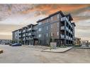 2308-55 Lucas Way Nw, Calgary, AB  - Outdoor With Balcony With Facade 