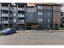 2308-55 Lucas Way Nw, Calgary, AB  - Outdoor With Balcony With Facade 