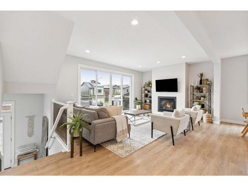 285 Sage Bluff Drive Nw, Calgary, AB - Indoor Photo Showing Living Room With Fireplace