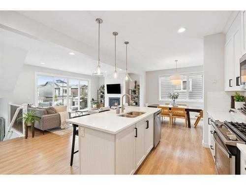 285 Sage Bluff Drive Nw, Calgary, AB - Indoor Photo Showing Kitchen With Double Sink With Upgraded Kitchen