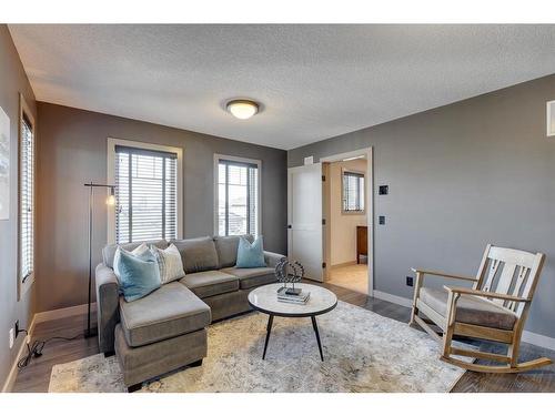 133 Silverado Ranch Manor Sw, Calgary, AB - Indoor Photo Showing Living Room