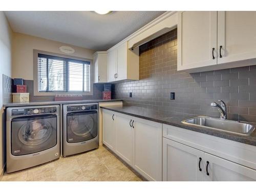 133 Silverado Ranch Manor Sw, Calgary, AB - Indoor Photo Showing Laundry Room