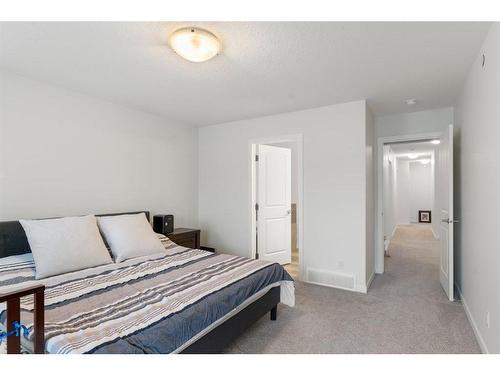 49 Lucas Heights Nw, Calgary, AB - Indoor Photo Showing Bedroom