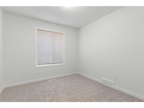 49 Lucas Heights Nw, Calgary, AB - Indoor Photo Showing Other Room