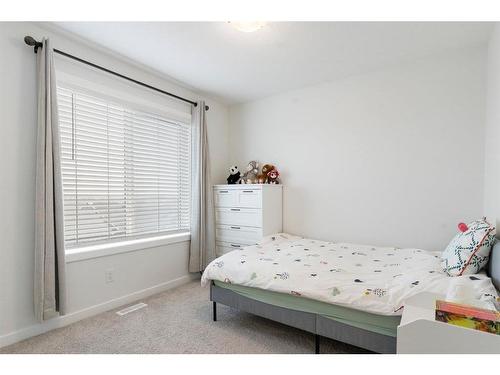 49 Lucas Heights Nw, Calgary, AB - Indoor Photo Showing Bedroom