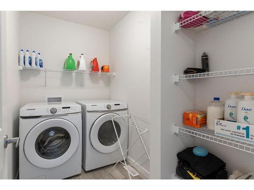 49 Lucas Heights Nw, Calgary, AB - Indoor Photo Showing Laundry Room