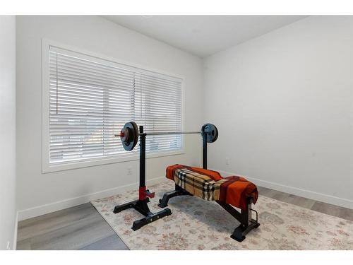 49 Lucas Heights Nw, Calgary, AB - Indoor Photo Showing Gym Room