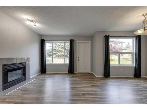 48 Catalina Circle Ne, Calgary, AB - Indoor Photo Showing Living Room With Fireplace