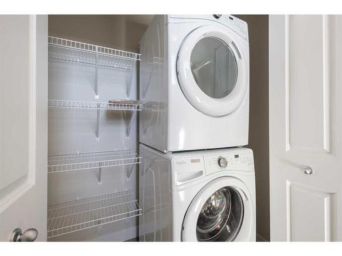 133 Sage Hill Grove Nw, Calgary, AB - Indoor Photo Showing Laundry Room