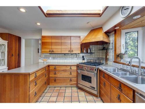 23 Croydon Road Nw, Calgary, AB - Indoor Photo Showing Kitchen With Double Sink