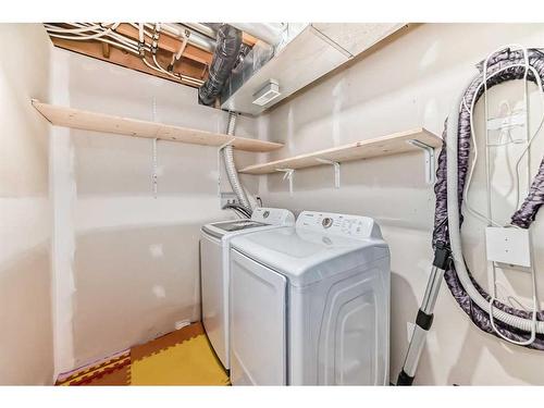 22 Hidden Hills Terrace, Calgary, AB - Indoor Photo Showing Laundry Room