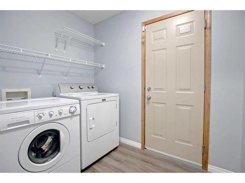 59 Panamount Lane Nw, Calgary, AB - Indoor Photo Showing Laundry Room