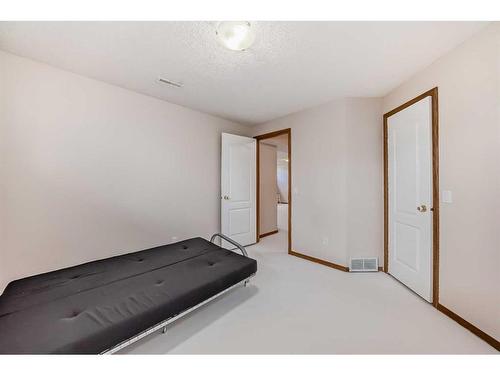 424 Cimarron Circle, Okotoks, AB - Indoor Photo Showing Other Room