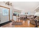 424 Cimarron Circle, Okotoks, AB  - Indoor Photo Showing Living Room 