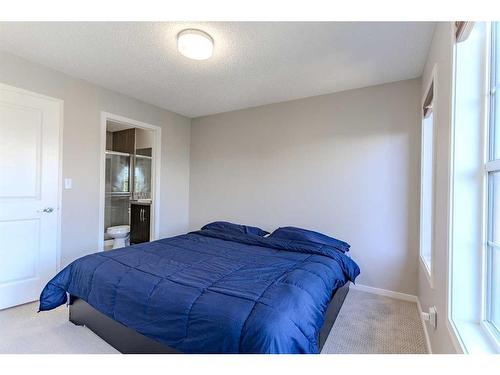 453 Ascot Circle Circle Sw, Calgary, AB - Indoor Photo Showing Bedroom