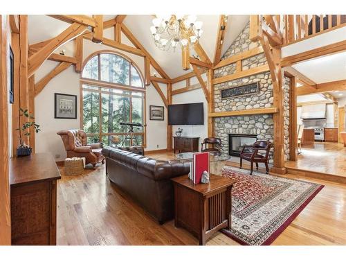 106 Lougheed Circle, Banff, AB - Indoor Photo Showing Living Room With Fireplace