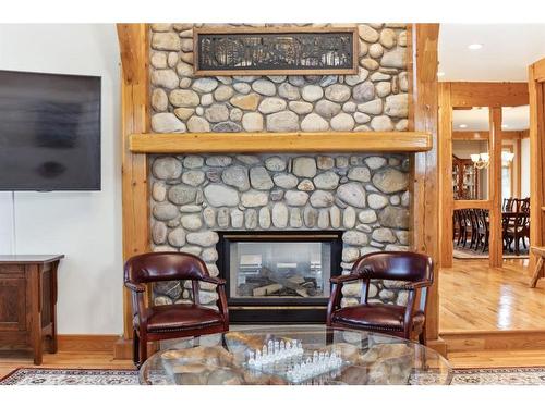 106 Lougheed Circle, Banff, AB - Indoor Photo Showing Living Room With Fireplace