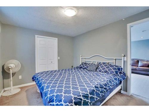 357 Saddlecrest Way Ne, Calgary, AB - Indoor Photo Showing Bedroom