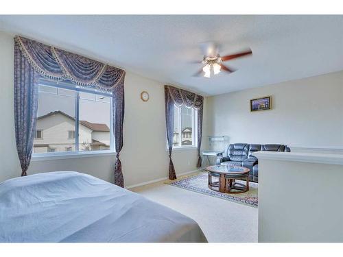 357 Saddlecrest Way Ne, Calgary, AB - Indoor Photo Showing Bedroom