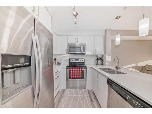 6307-302 Skyview Ranch Drive Ne, Calgary, AB - Indoor Photo Showing Kitchen With Stainless Steel Kitchen With Double Sink With Upgraded Kitchen