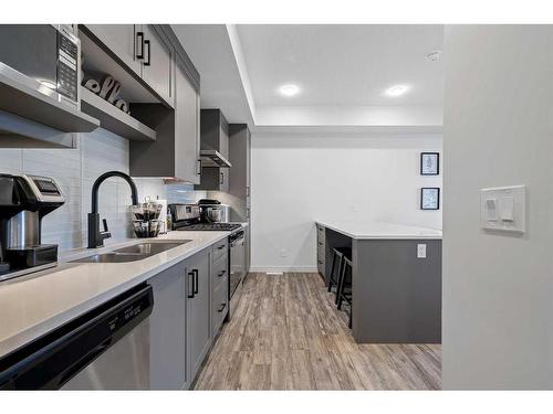 2104-100 Walgrove Court Se, Calgary, AB - Indoor Photo Showing Kitchen With Double Sink