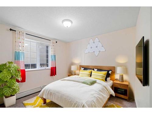 102-705 56 Avenue Sw, Calgary, AB - Indoor Photo Showing Bedroom