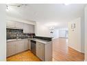 102-705 56 Avenue Sw, Calgary, AB  - Indoor Photo Showing Kitchen 