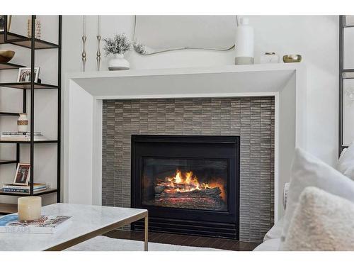 110 Patterson Hill Sw, Calgary, AB - Indoor Photo Showing Living Room With Fireplace