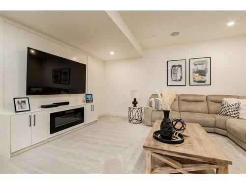 6427 Bow Crescent Nw, Calgary, AB - Indoor Photo Showing Living Room With Fireplace