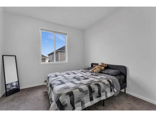 801 Windrow Green Sw, Airdrie, AB - Indoor Photo Showing Bedroom