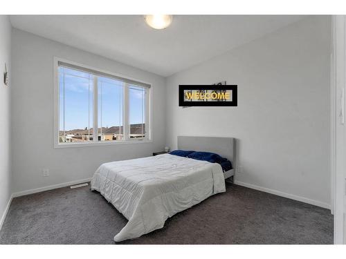 801 Windrow Green Sw, Airdrie, AB - Indoor Photo Showing Bedroom