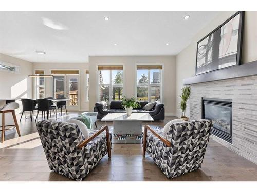 283 Nolan Hill Boulevard Nw, Calgary, AB - Indoor Photo Showing Living Room With Fireplace