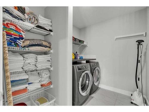 206 Sage Bluff Rise Nw, Calgary, AB - Indoor Photo Showing Laundry Room