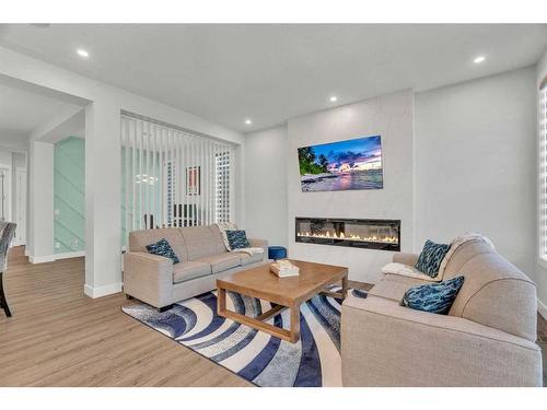 206 Sage Bluff Rise Nw, Calgary, AB - Indoor Photo Showing Living Room With Fireplace