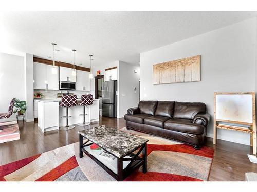 21 Redstone Road Ne, Calgary, AB - Indoor Photo Showing Living Room