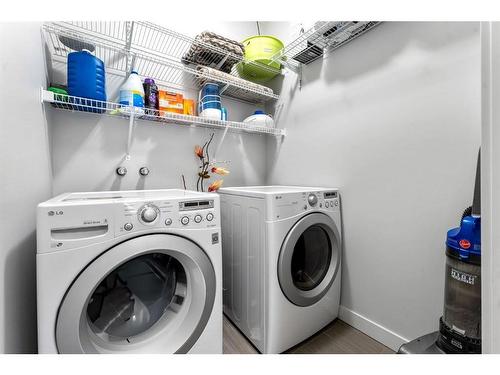 21 Redstone Road Ne, Calgary, AB - Indoor Photo Showing Laundry Room